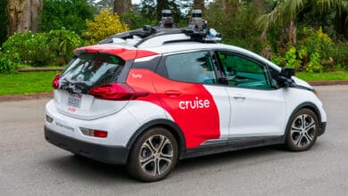 Self-driving Chevrolet Bolt by Cruise Automation undergoing testing in San Francisco. The vehicle is equipped with numerous Velodyne LiDAR sensors